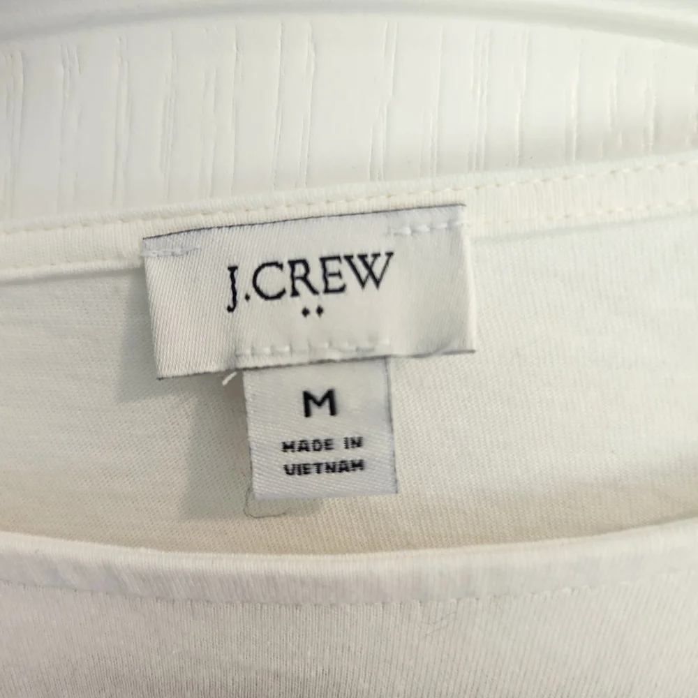 J. CREElegant White Ruffled Top